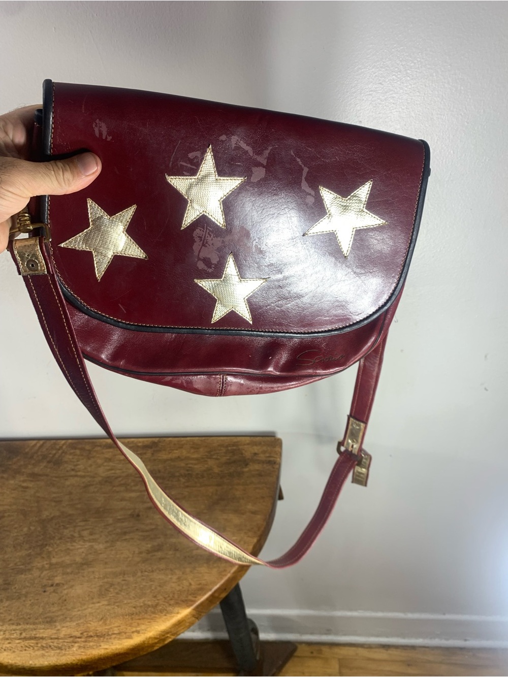 Vintage scoro Roma italy burgundy leather crossbody bag gold star appliqué
